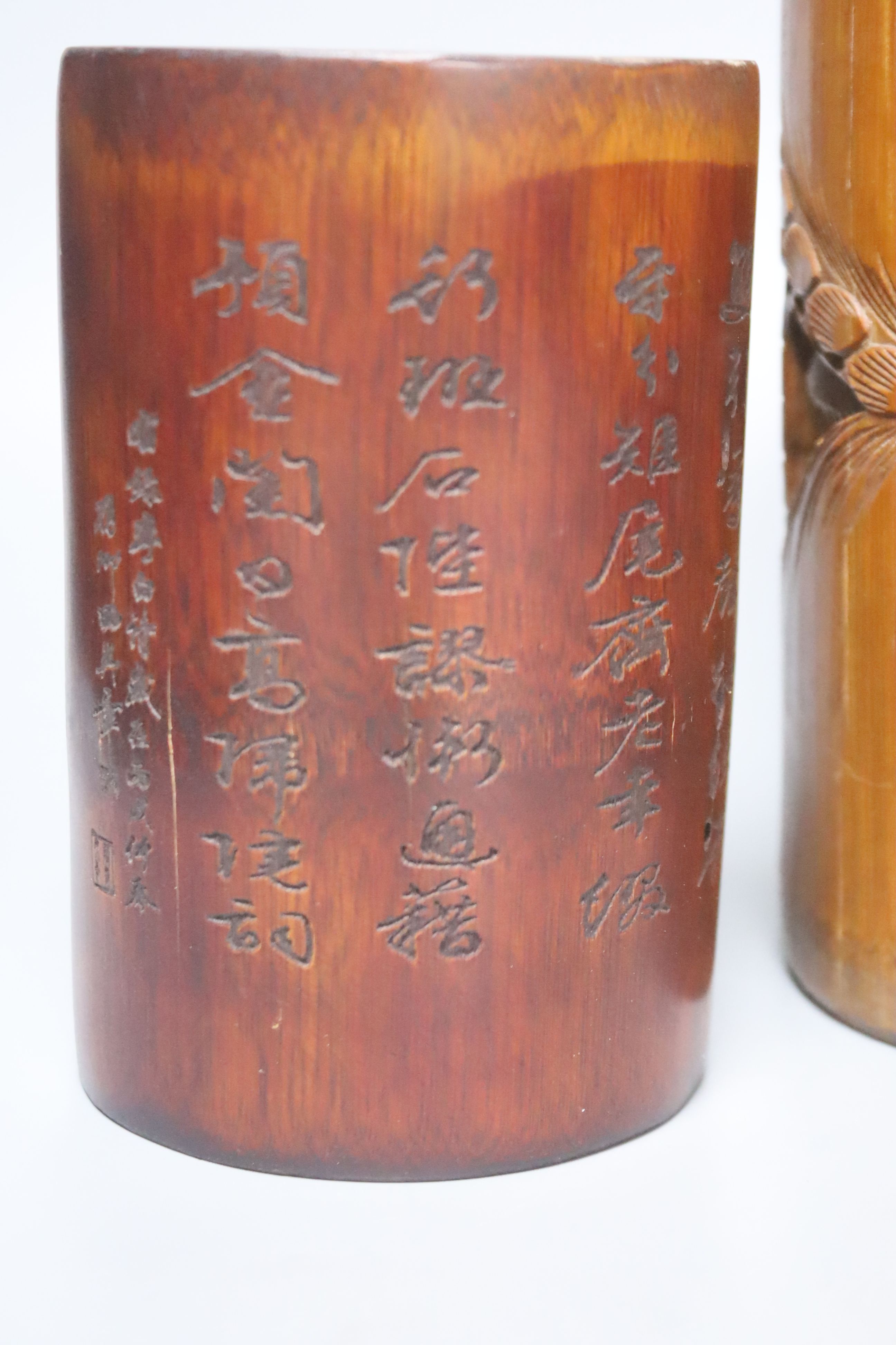 Four Chinese wood and bamboo brush pots, tallest 32cm